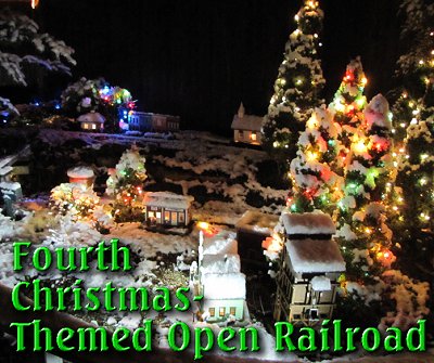 Actually, the snow didn't fall until the week after our open railroad, but the Christmas charm was there all the same.  Click for bigger photo.