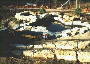 This photo was taken about December, 1998. The pond and connecting pond were in place and surrounded by rocks. Click for bigger photo.