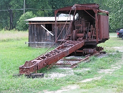 Steam-powered cranes like this one were used to move logs and also to set up the networks of posts, cables, ropes, and pulleys that were used to 'skid' logs across difficult terrain.