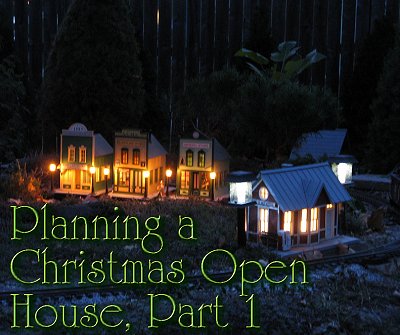 Planning a Christmas Open House, Part 1. Replacing buildings and testing lighting were just two of the many tasks facing me as I planned for a 'cold-weather' open house in November, 2008. The Piko storefronts came from Louie Pittoli, complete with streetlamps, bases, and wiring.  Click for a bigger photo.