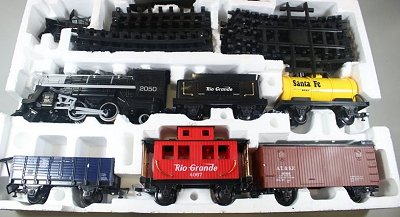 A typical 'modern' Scientific Toys/Ez-Tec train set.  Note the very large windows on the caboose. Click for bigger photo.